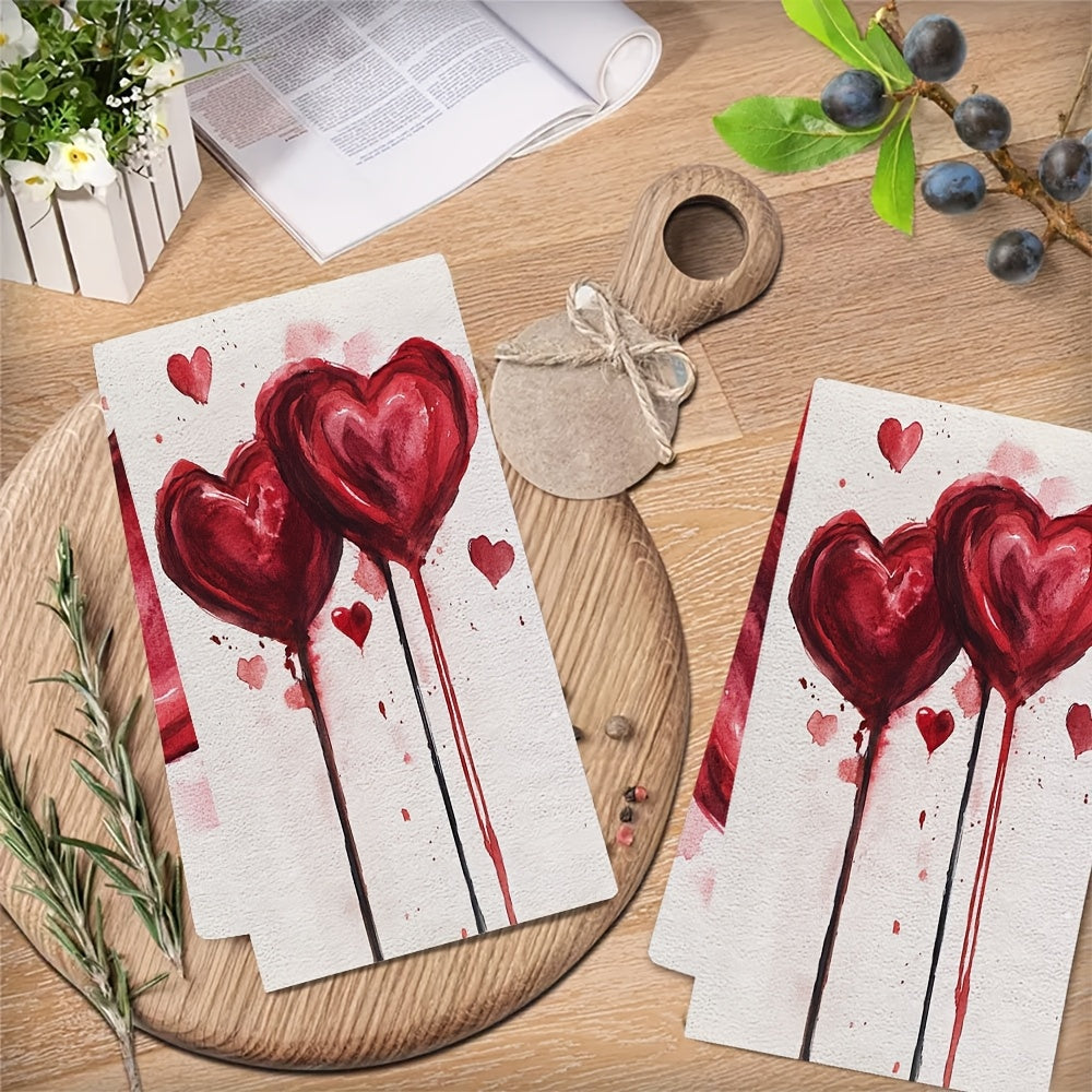 Two pieces of ultra soft kitchen towels featuring a Valentine's Vibes heart design. These towels are highly absorbent, machine washable, and perfect for drying dishes. With a contemporary style, they measure 40.64x60.96 cm each.