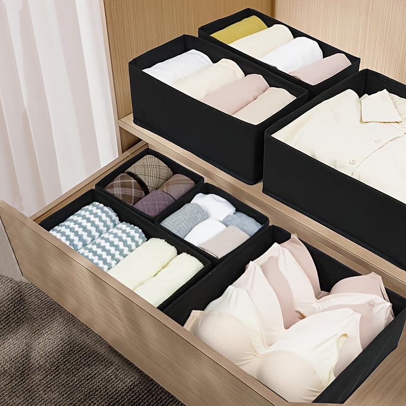 This 6-piece set of fabric drawer organizers is perfect for home organization. Each box is unfinished and foldable, making them versatile and easy to use. Suitable for ages 14 and up, these weather-resistant storage boxes are under 3.2 cubic feet and