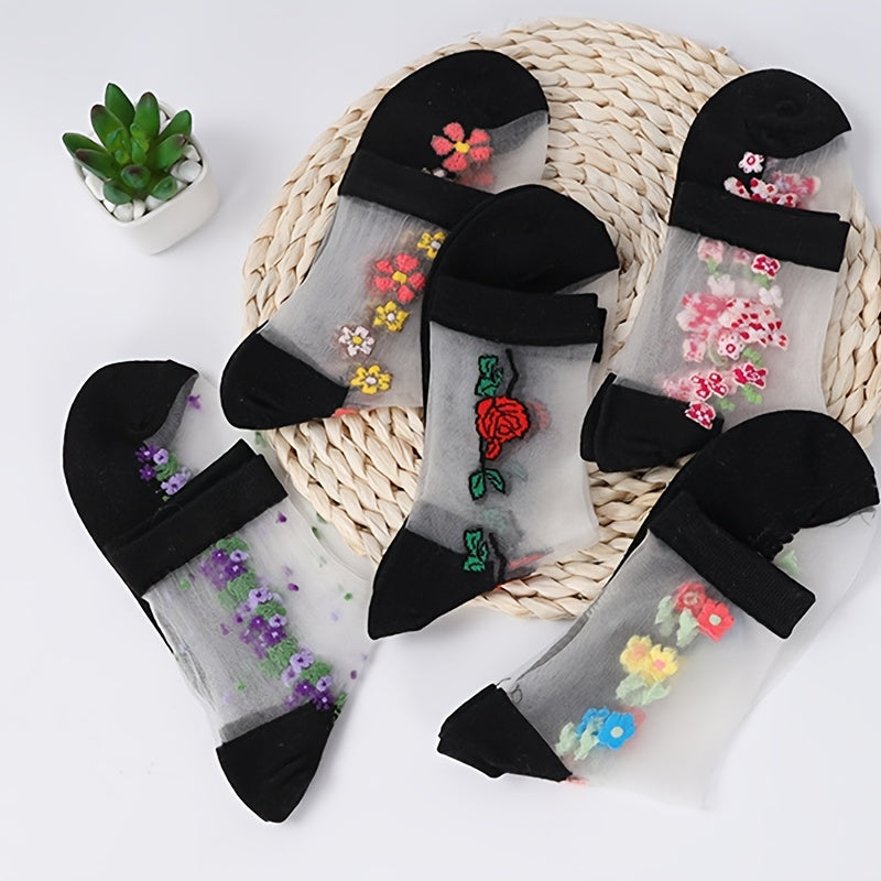 5 pairs of women's floral crystal mesh short socks in black with multicolor flower patterns. Made of ice silky fiber that is breathable and lightweight. Hand wash only. Cute socks.