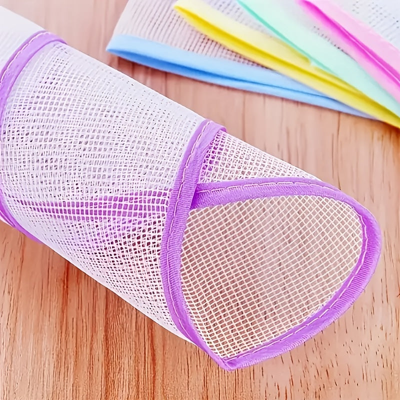 Protect your clothes from heat damage with the Heat Resistant Ironing Net Mat - the perfect home accessory for steam ironing.