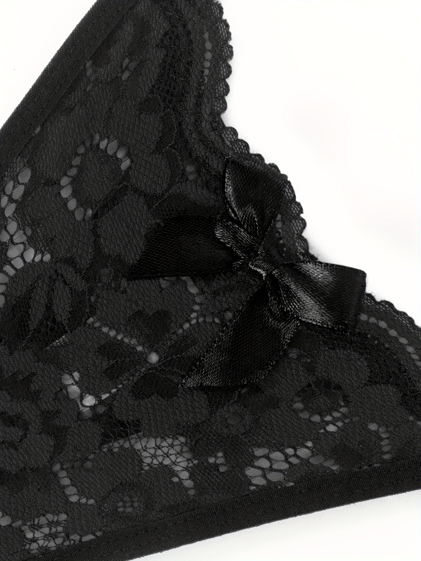 Comfy floral lace thongs with bow tie cutout, women's lingerie.