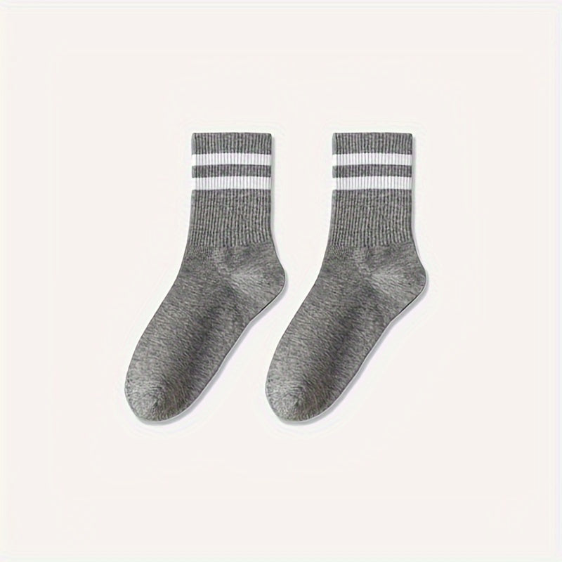 3 pairs of trendy men's striped crew socks, breathable and comfy for outdoor wear.