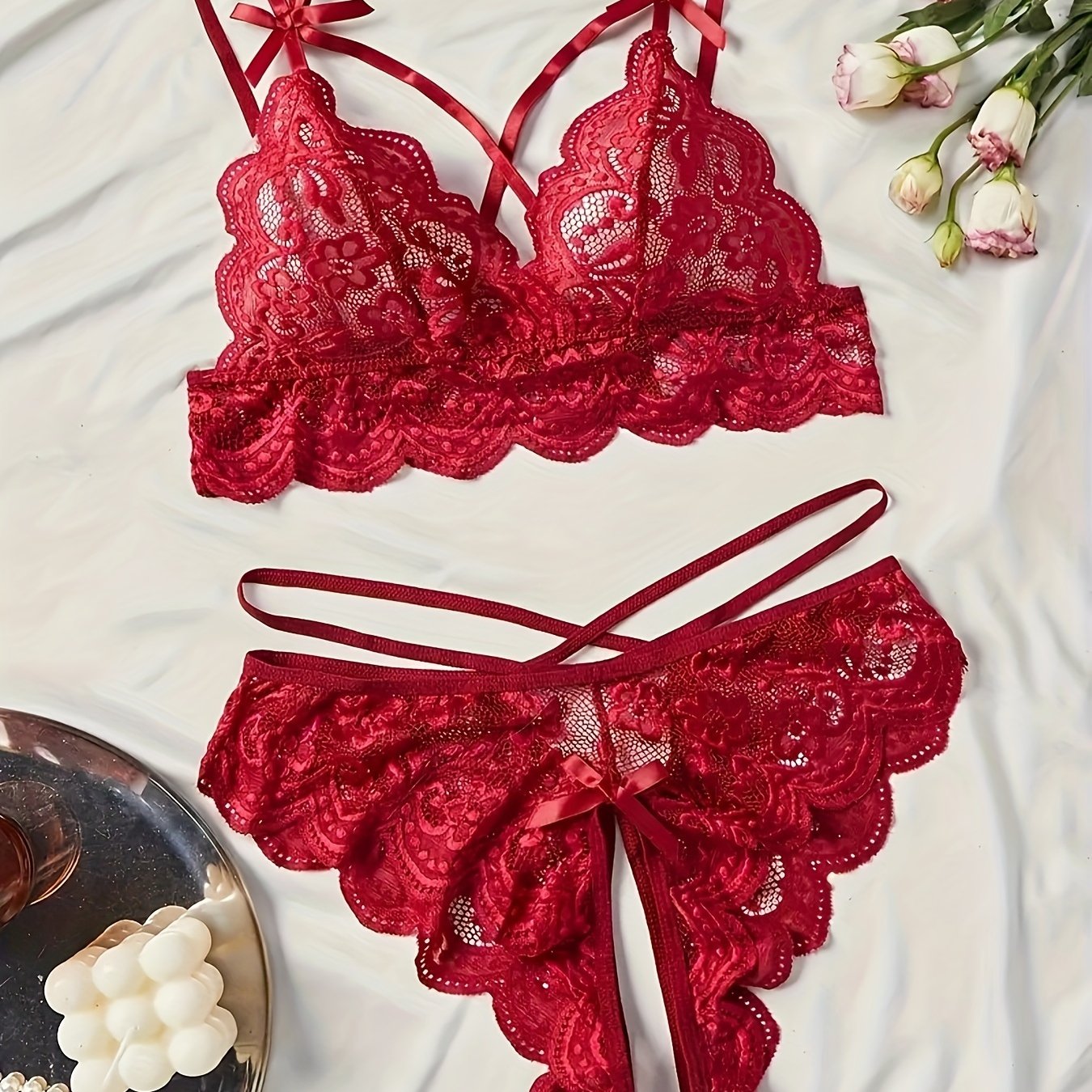 Floral lace lingerie set with push-up bra and strappy thong for women.