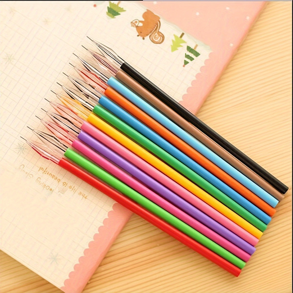 Set of 12 candy-colored 0.5mm refills for note-taking.