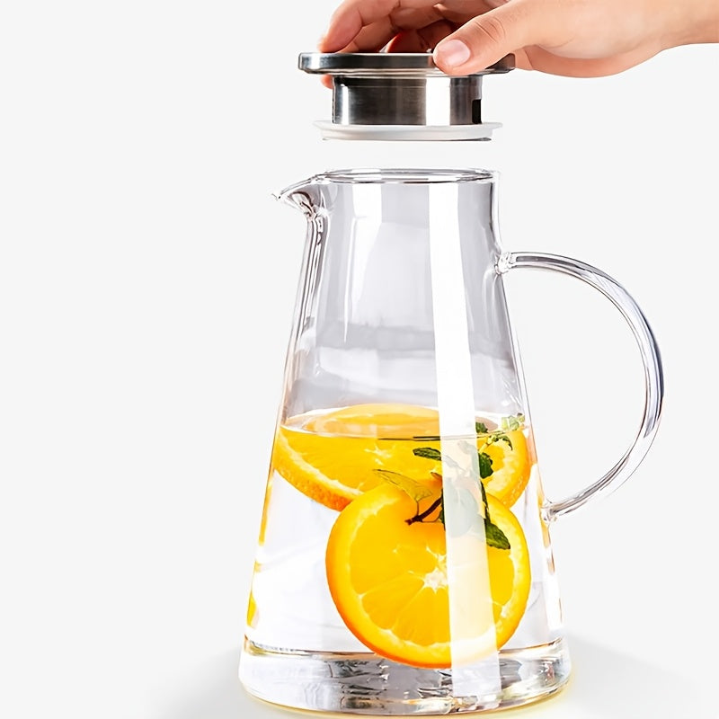 Heat resistant glass pitcher with lid, perfect for hot/cold drinks. Featuring a 1.8L clear beverage carafe with handle for easy serving. Ideal for home, restaurant, or office use. Easy to clean and makes a great gift for Christmas or New Year. A