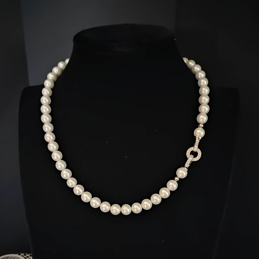 Impeccably crafted from natural freshwater pearls measuring 7-8mm, this stunning necklace features a silvery diamond round buckle. Presented in an elegant gift box, it is suitable for both male and female recipients and perfect for everyday wear