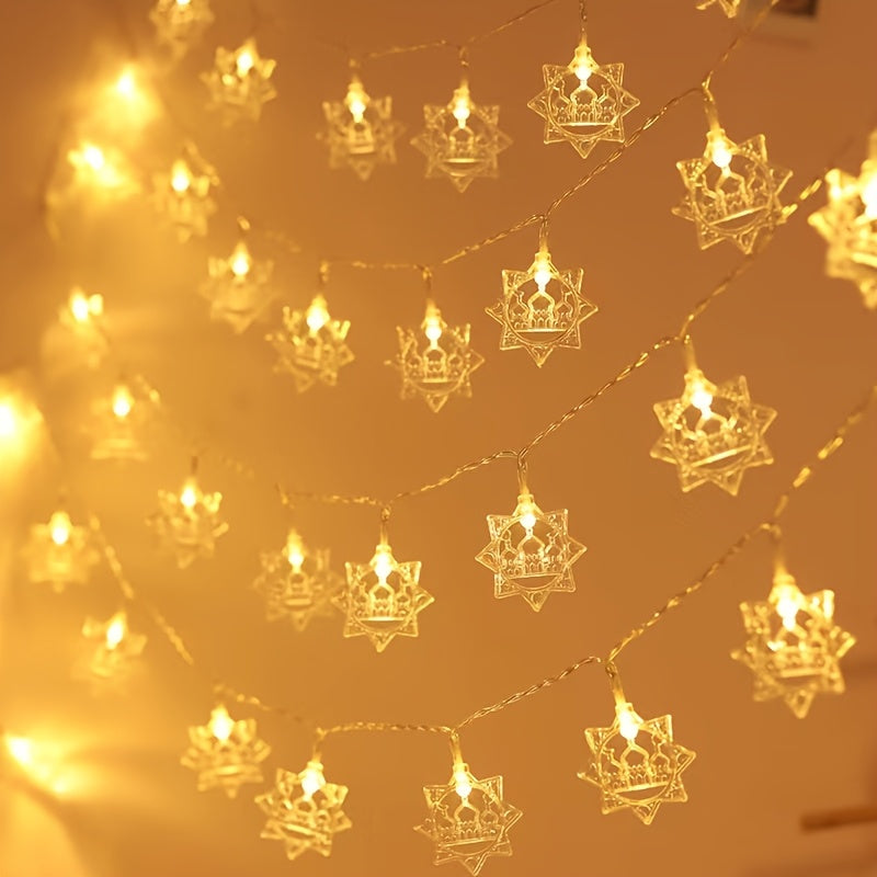 Battery-powered LED string lights with a golden Islamic-themed design featuring stars and moons, perfect for Ramadan, Diwali, and holiday décor. Made of plastic, switch-controlled, and