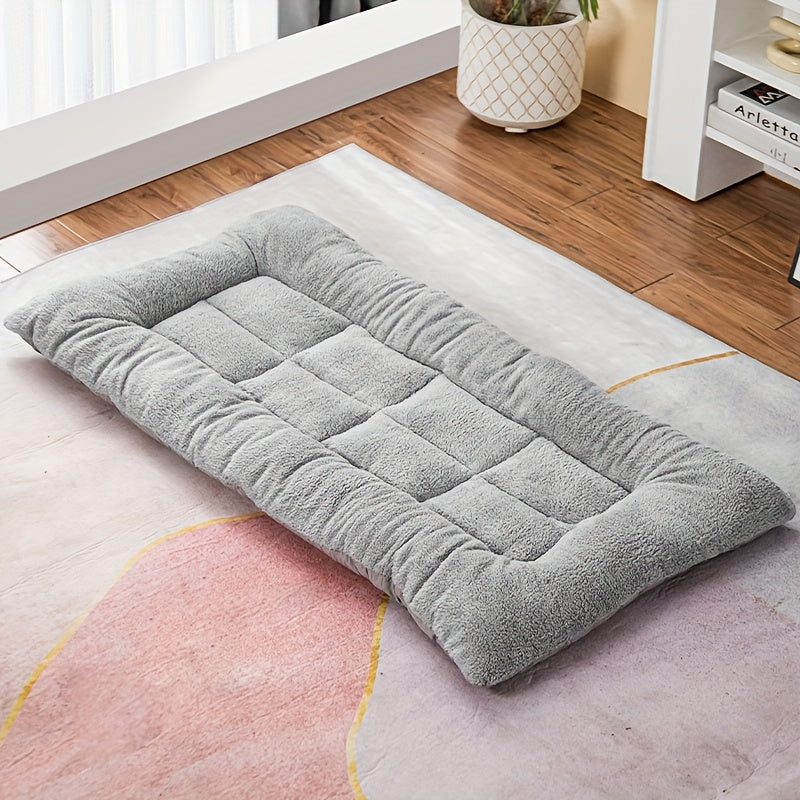 Large plush dog bed with soft, thick polyester fiber, in light gray and white, for small to large breeds, providing quilted comfort on a cozy rectangular couch.