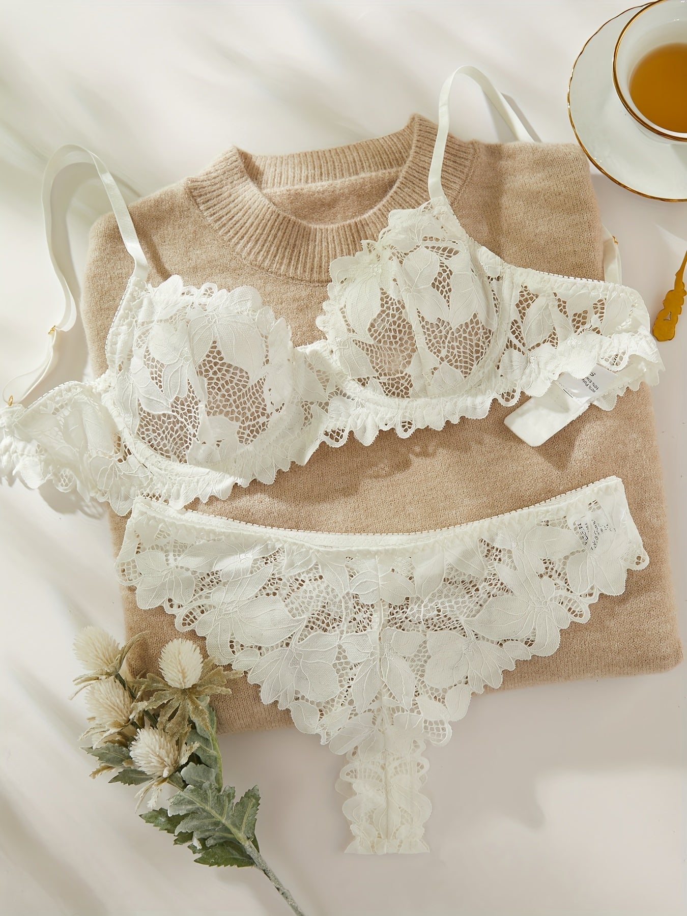 Floral lace lingerie set with unlined bra and panties for women.