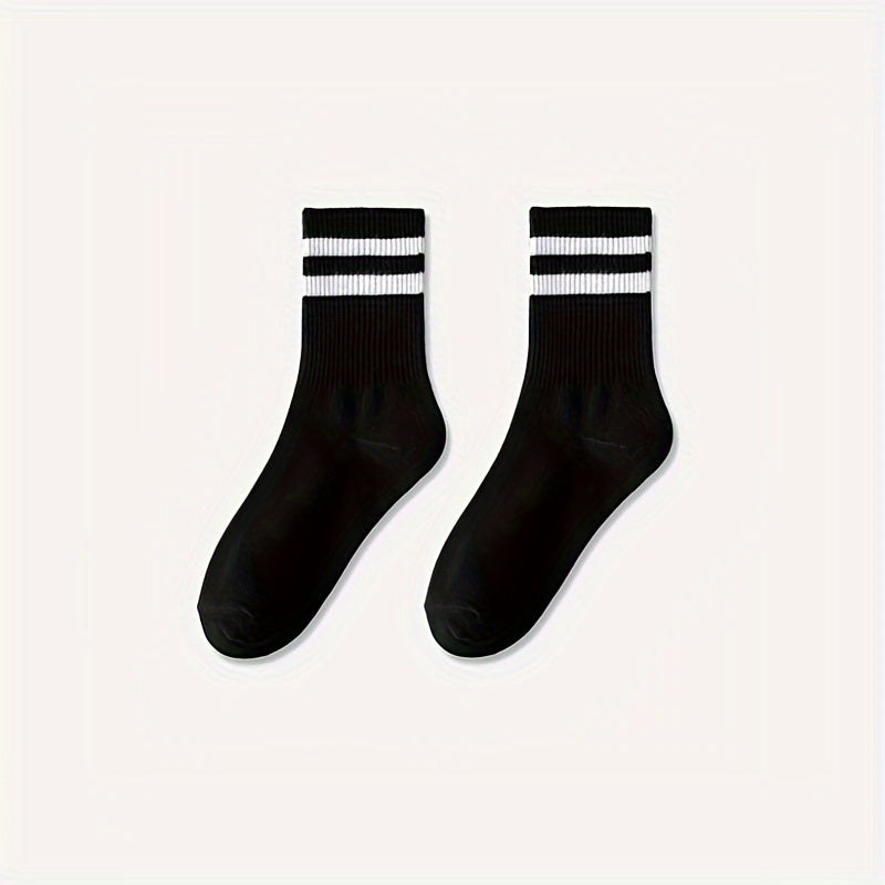 3 pairs of trendy men's striped crew socks, breathable and comfy for outdoor wear.