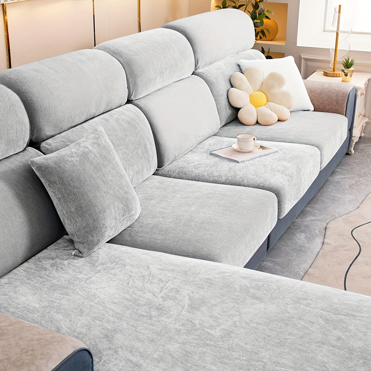 Stretchable plush velvet sofa cushion cover in contemporary gray with white accents; fits 1 to 4-seater sofas, machine washable, perfect for home decor.