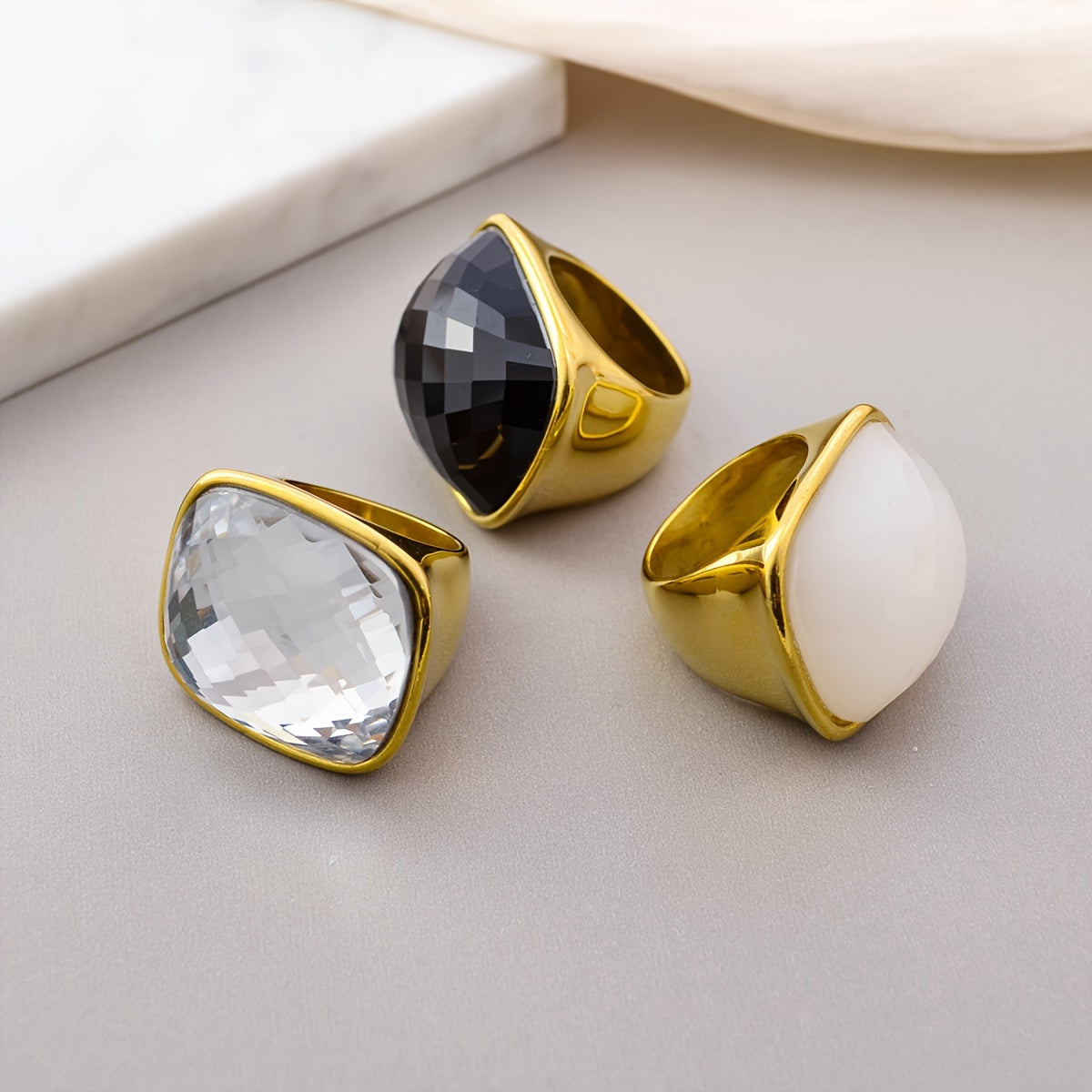 Elevate Your Look with our 1PC Hip Hop Luxury Style Square Gemstone Ring! This elegant statement ring features a large stone and is perfect for daily wear or special occasions. Made with 18K plated zirconia inlay and stainless steel band, this Mardi Gras