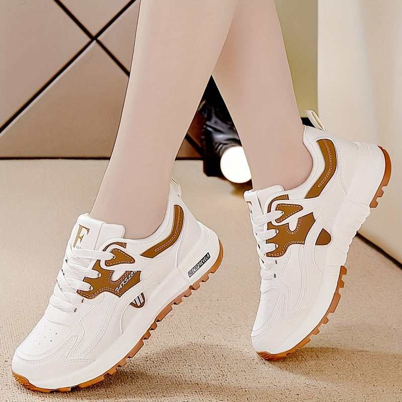 Women's casual sneakers with contrasting colors, lace-up design, platform sole, and comfortable walking features.