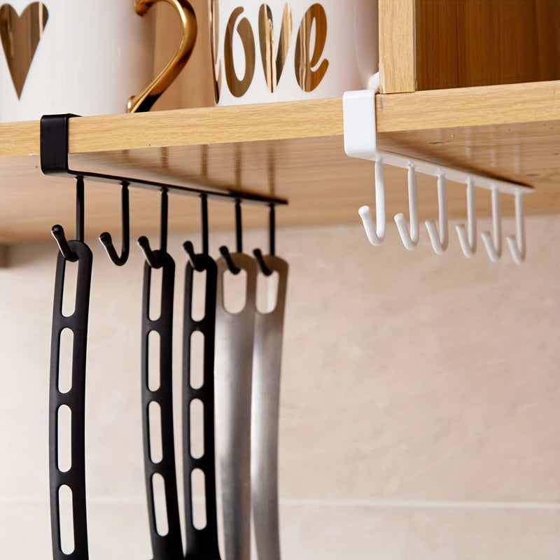 Keep your kitchen cups, mugs, and utensils organized with this durable iron under cabinet hanging storage organizer. Includes 6 detachable hooks for easy access. Perfect for saving space in your home or office.