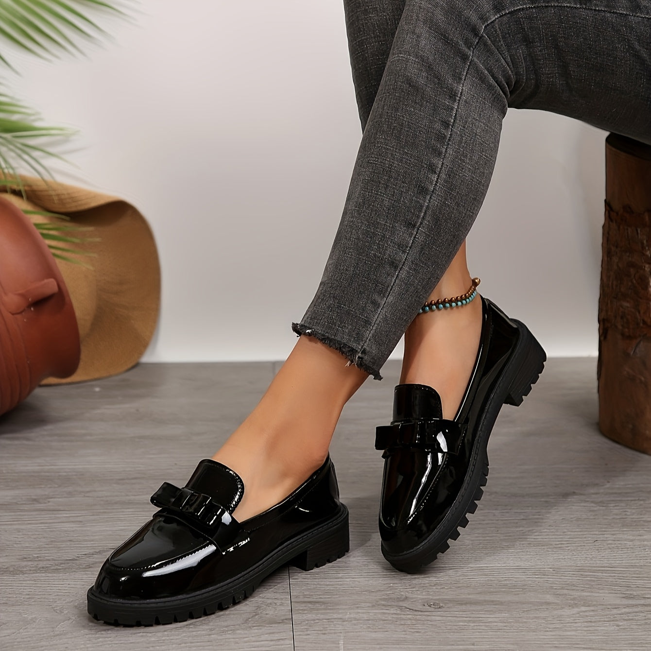 Black faux leather loafers for women with bow detail - comfortable slip-on dress shoes for spring and autumn, perfect for casual or office wear.