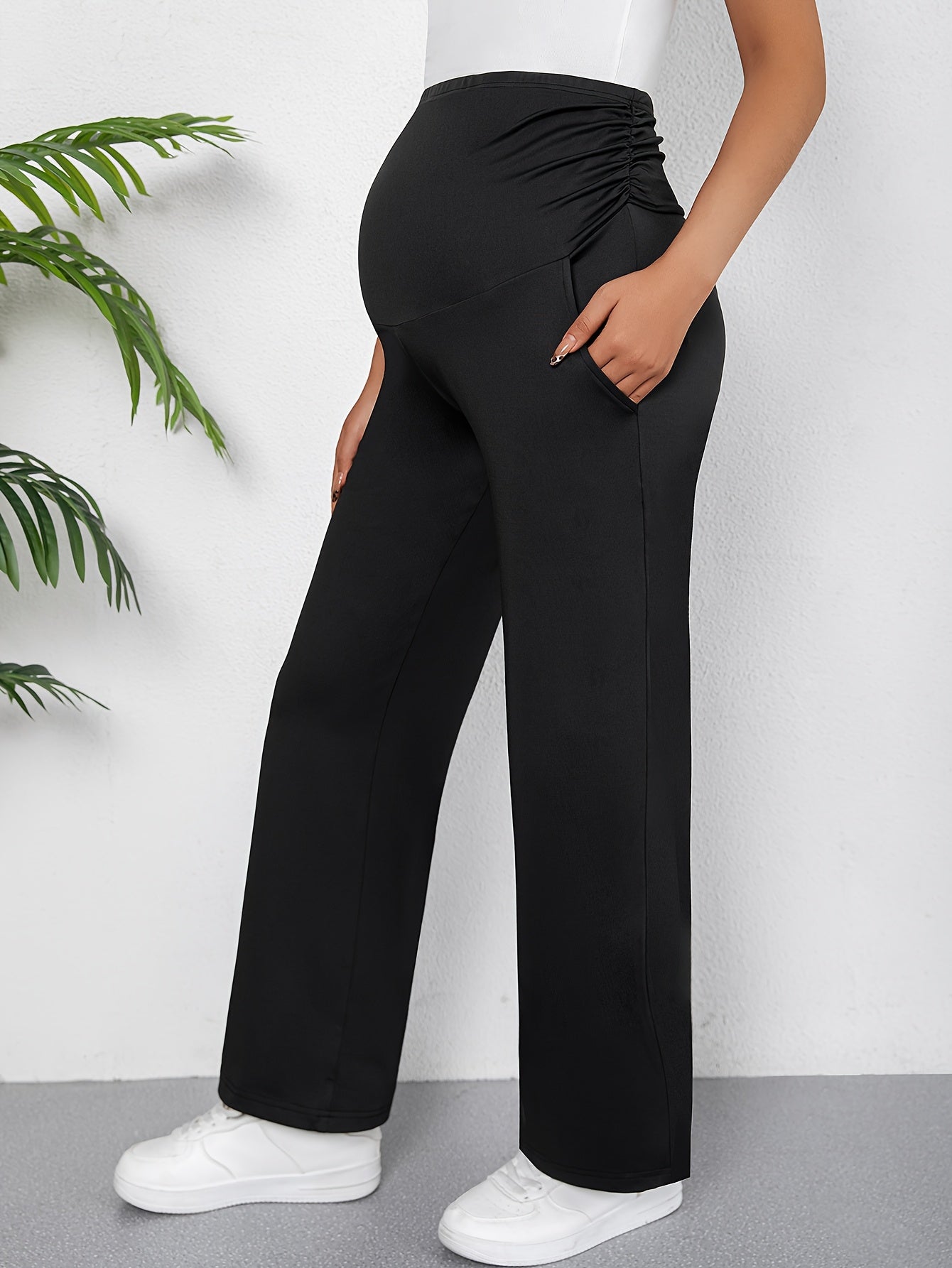 Chic maternity pants with high waist, slant pockets, and stretchy comfort for all seasons