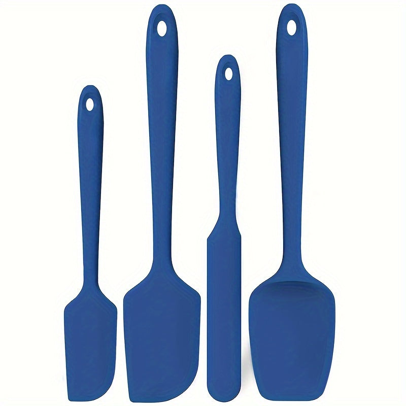 4-piece set of U-Taste heat resistant silicone spatulas for nonstick cookware, with a high temperature resistance of 600ºF and seamless, BPA-free design for safe food handling.