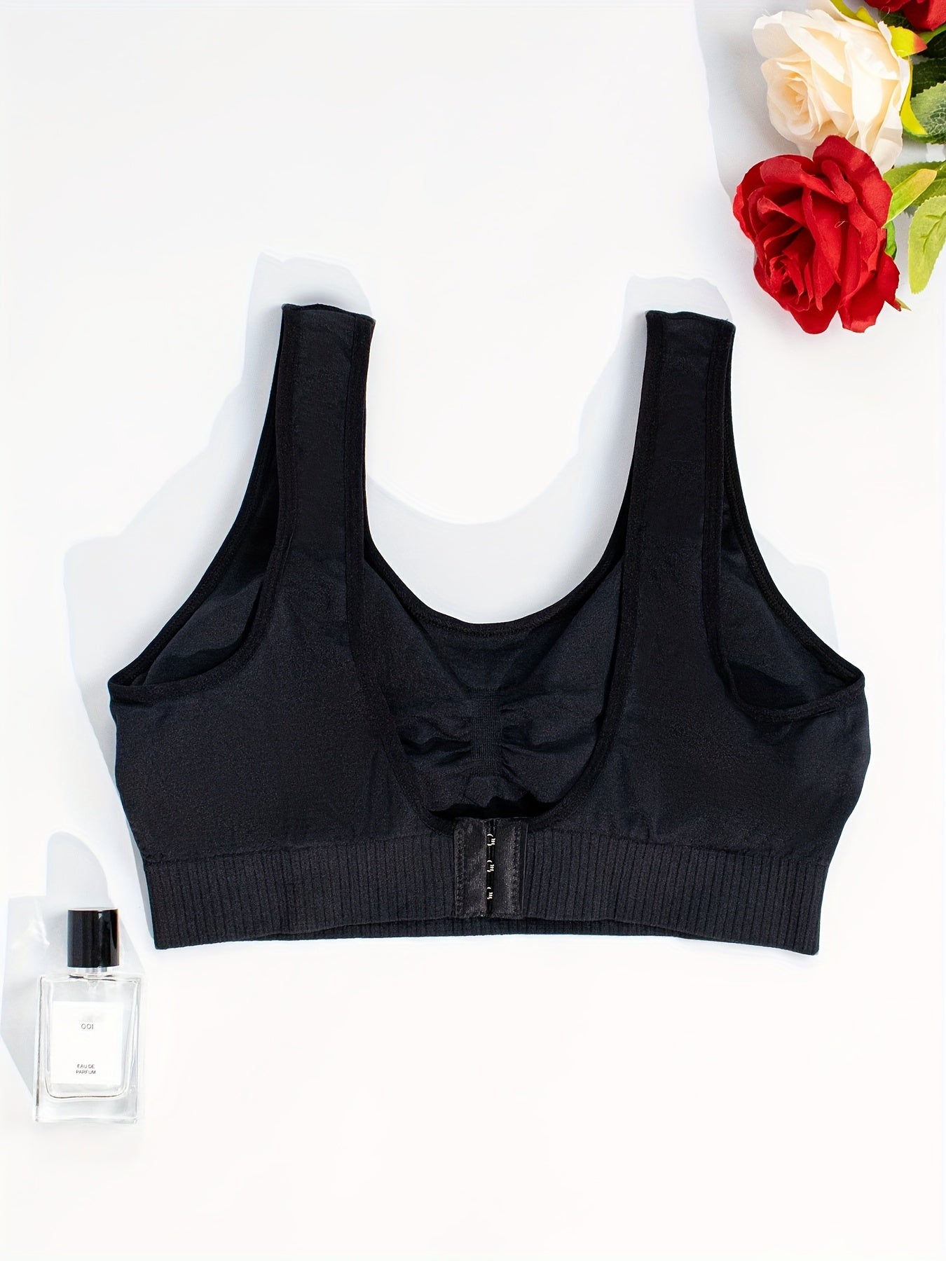 1 set of solid color seamless stretch wireless sports bra and black underwear for women, including lingerie.