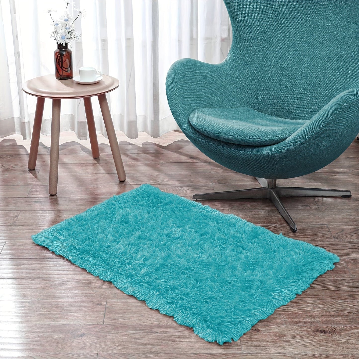 High-end quality Ultra-Soft Plush Faux Fur Area Rug with Tie-Dye Design is perfect for adding a touch of warmth and style to your living room, bedroom, or sunroom decor. This non-slip and durable rug is made of ponge and is suitable for most families.