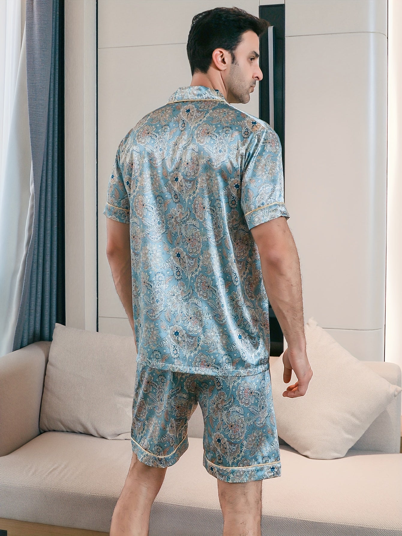 2 Men's short-sleeved floral print pajama set for summer.