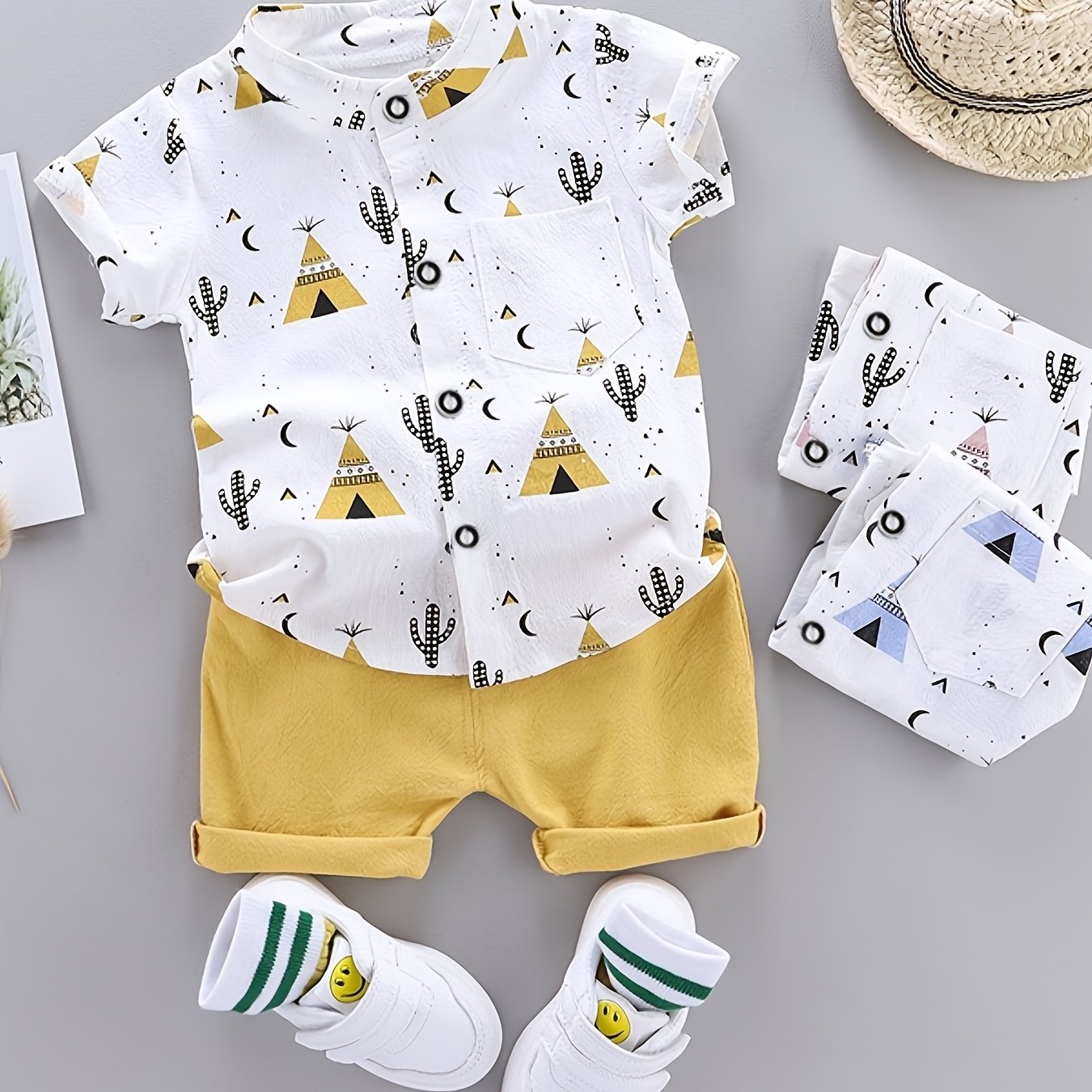 Boys' casual gentleman set with pyramid print, including standing collar button-up shirt and shorts. Comfortable and loose fit for outdoor activities.