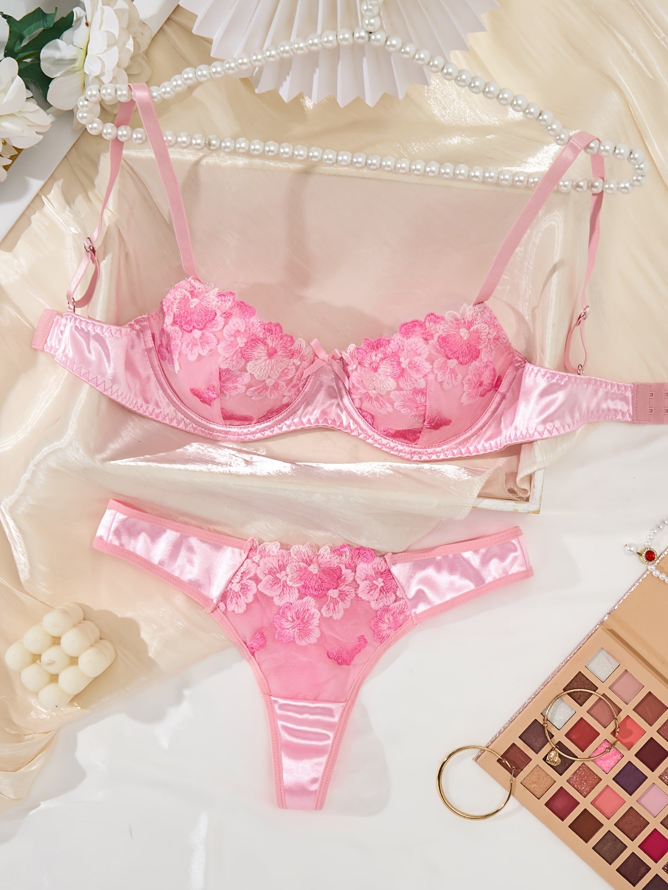 Chic pink floral lingerie set for women, featuring a comfortable push-up bra and low-rise briefs - ideal for casual wear.