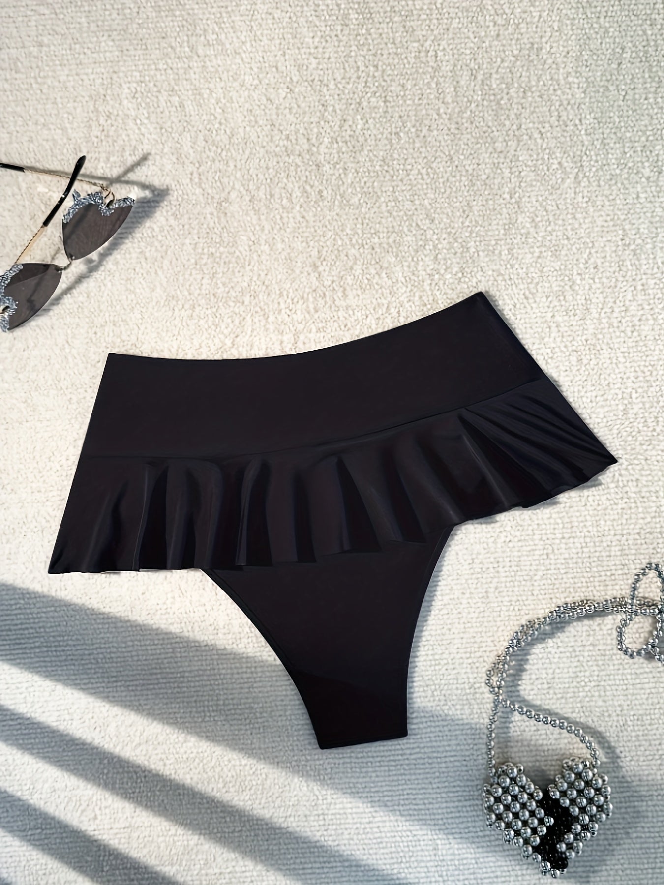 Stylish high-waist ruffle bikini swim shorts for women - Solid color, stretchy polyester blend perfect for summer beach fashion.