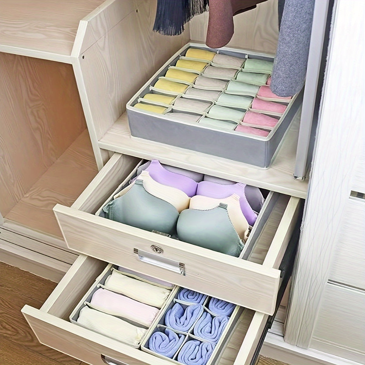 These 4 Foldable Non-woven Fabric Storage Boxes are designed specifically for organizing underwear, bras, socks, and other clothing items. Keep your wardrobe neat and tidy with these convenient compartment storage boxes that can easily be folded away