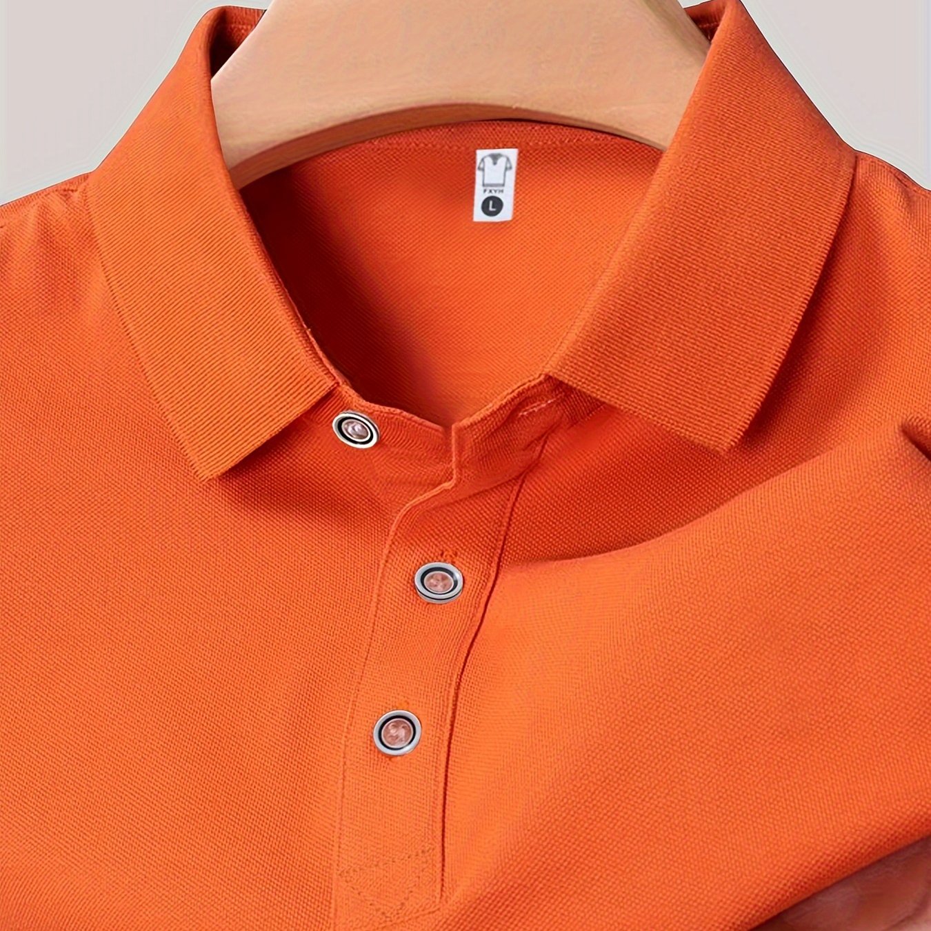 Men's summer casual short sleeve shirt in green, made of 100% polyester knit fabric with slight stretch. Regular fit with solid color lapel collar and button details. 145G/M².