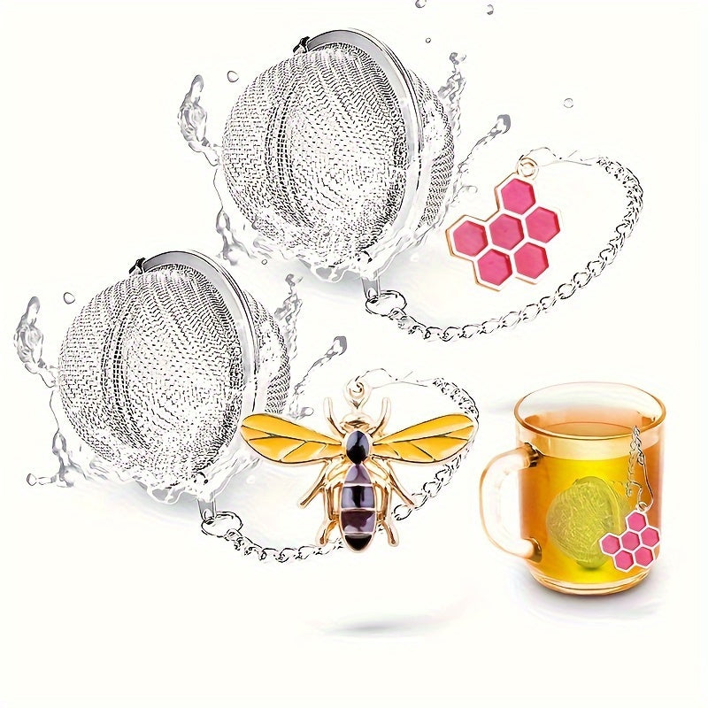 Gift your loved ones with a set of two stainless steel tea strainers adorned with charming honeybee and beehive designs. These durable infusers come with hanging chains and are perfect for brewing loose leaf tea. Ideal for Christmas, Thanksgiving