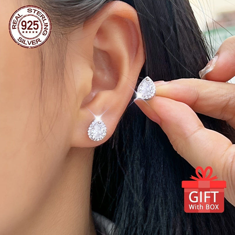 Get a pair of timeless heart-shaped synthetic zirconia stud earrings, perfect for any occasion. Made of 925 sterling silver plated material, these earrings are hypoallergenic and feature a simple round design. They come in a beautiful gift box, making