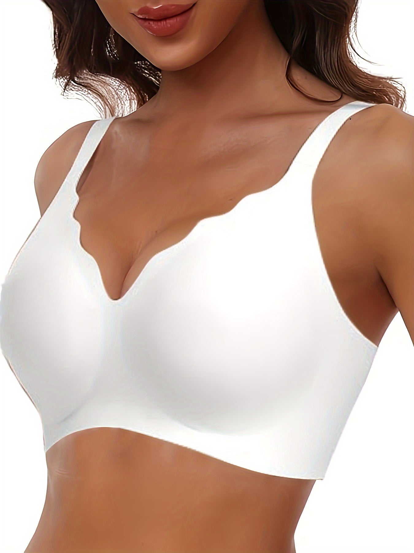 Seamless wireless push-up bra with deep V-neck and scalloped design for comfortable support