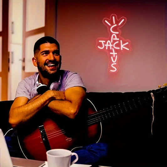 Cactus Jack Red Neon Sign is a USB-powered wall hanging light with a push button control. It is a versatile decor piece for bedrooms, home bars, pubs, parties, and is inspired by West Coast rap culture.