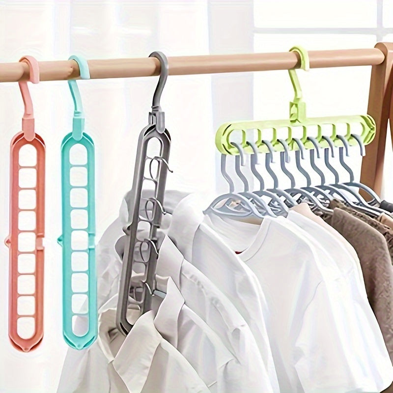 Space-saving multi-hole clothes hanger for home, dorm, and travel - foldable drying rack for trousers, shirts, and skirts, also doubles as a shower caddy.