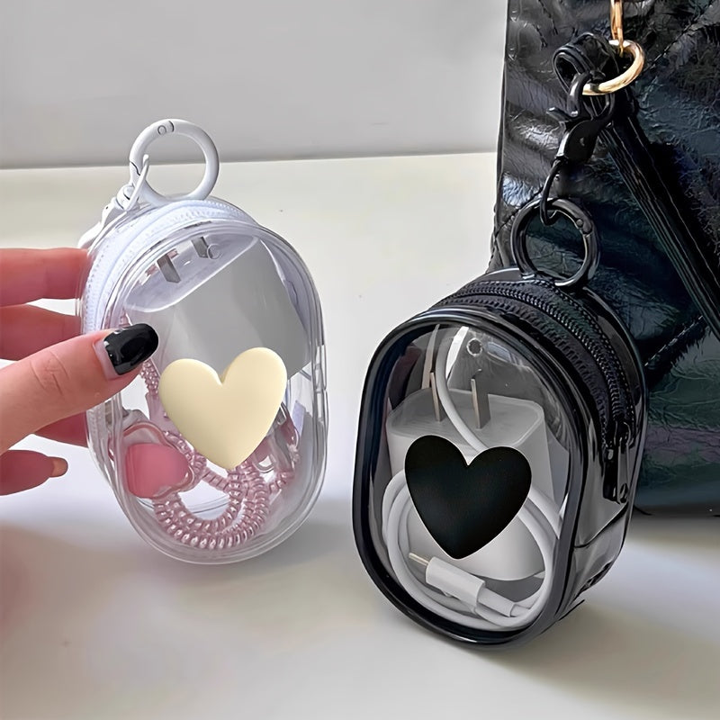 Waterproof heart-shaped PVC bag with keychain for organizing cables and headphones.