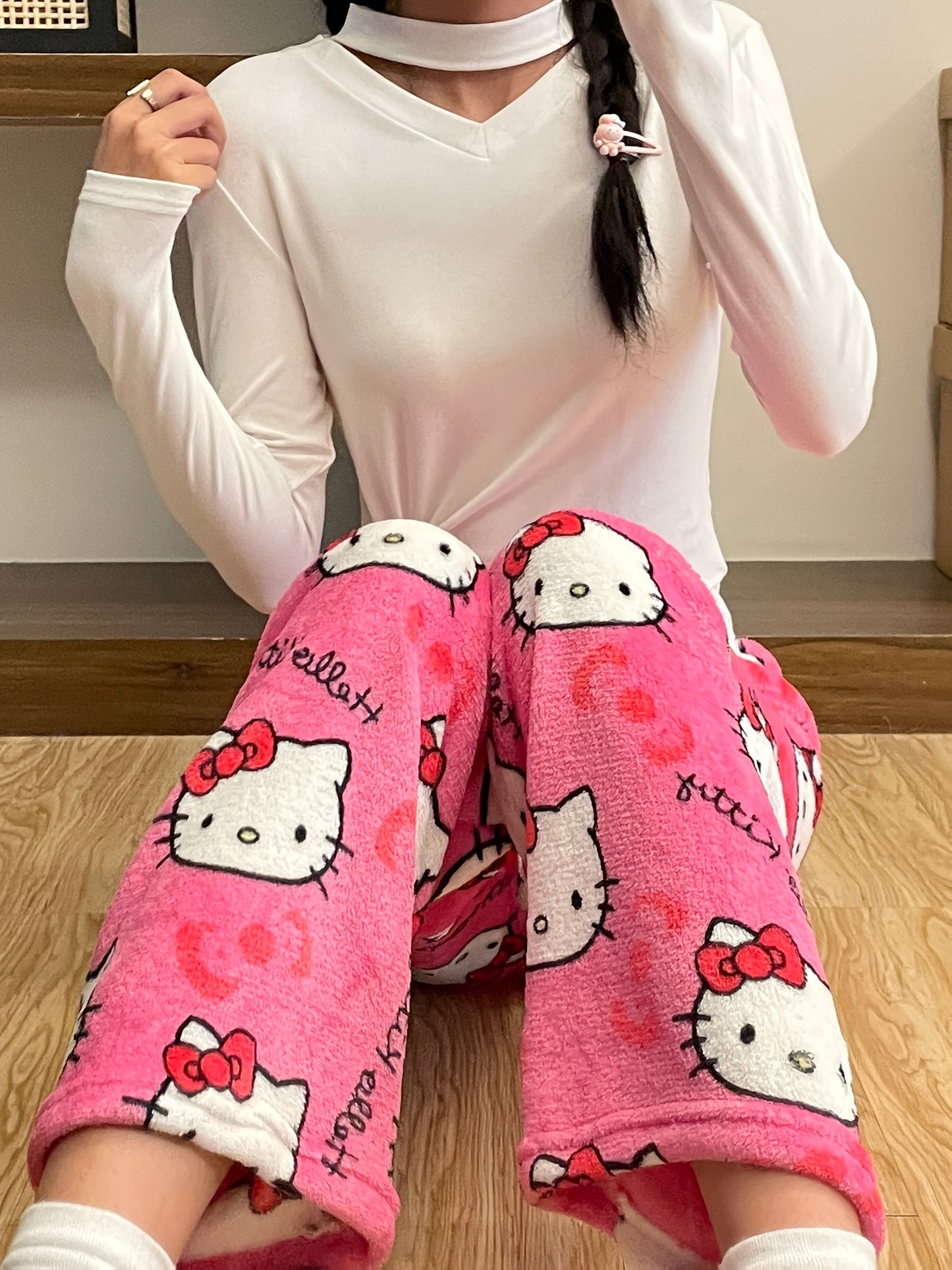 Sanrio Hello Kitty cozy flannel pajamas for women, officially licensed and perfect for relaxing and sleepwear.