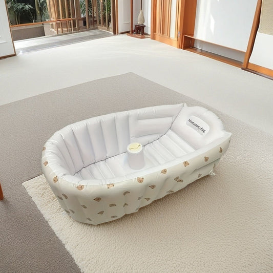 Soft and foldable portable inflatable bathtub featuring a cute cartoon design. Perfect for travel and home use, ideal for caring for youngsters.