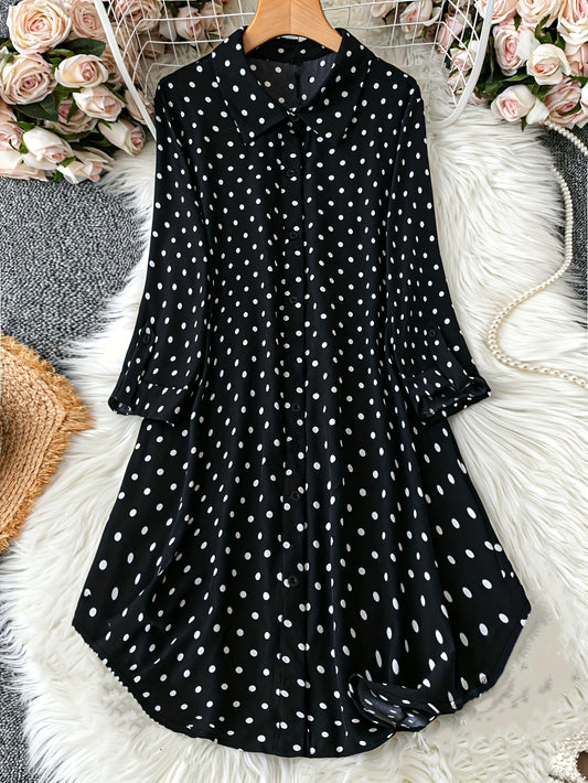 Polka dot print dress with button front and long sleeves for plus size women.