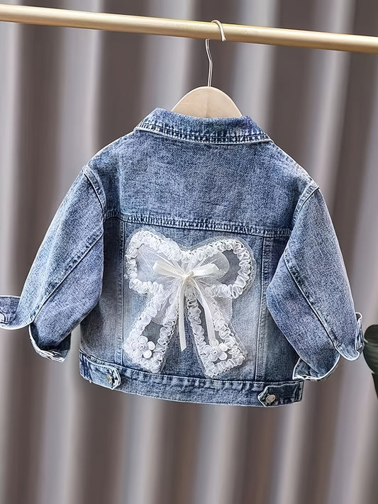 Children's loose fit denim jacket for girls, made from soft fabric.