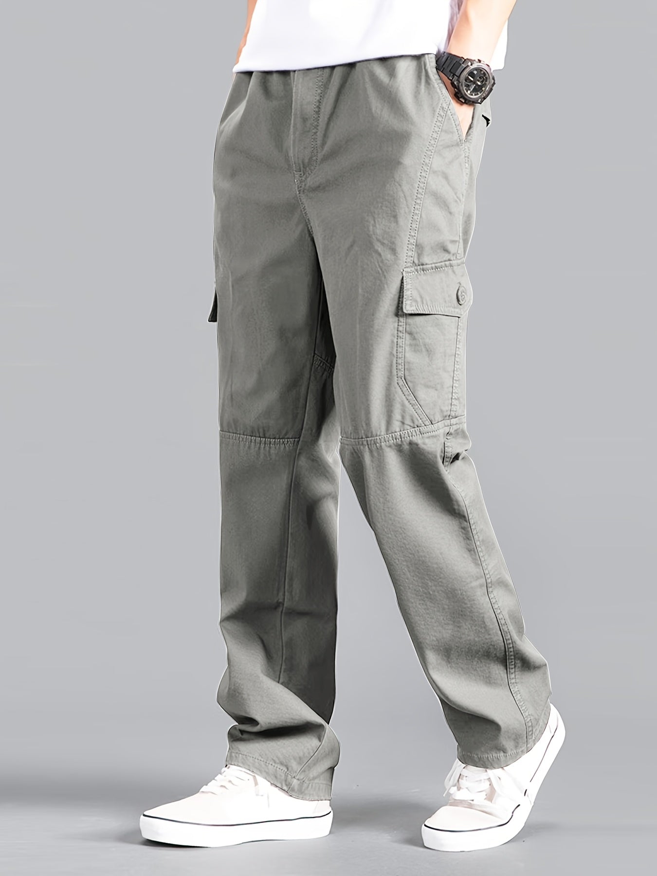 Casual cotton cargo pants for men, with solid color, multi-pocket design, loose fit, and non-stretch woven fabric. Ideal for daily wear in the Spring/Fall Collection.