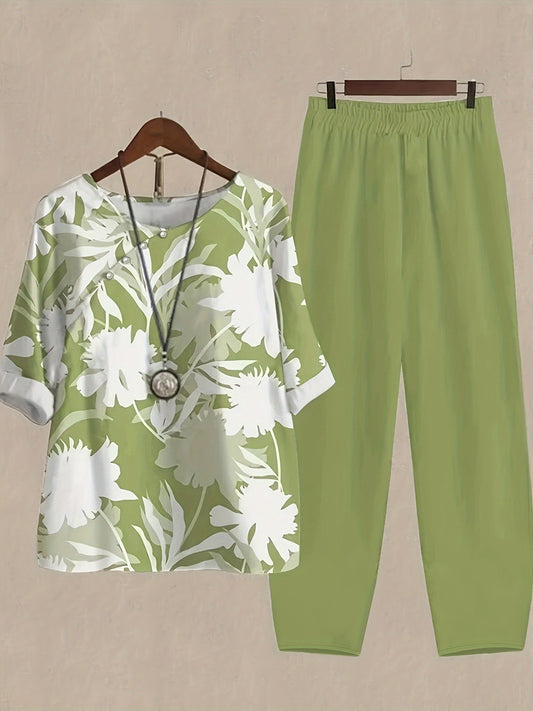 2-piece floral print outfit with crew neck top and elastic waist pants for women.