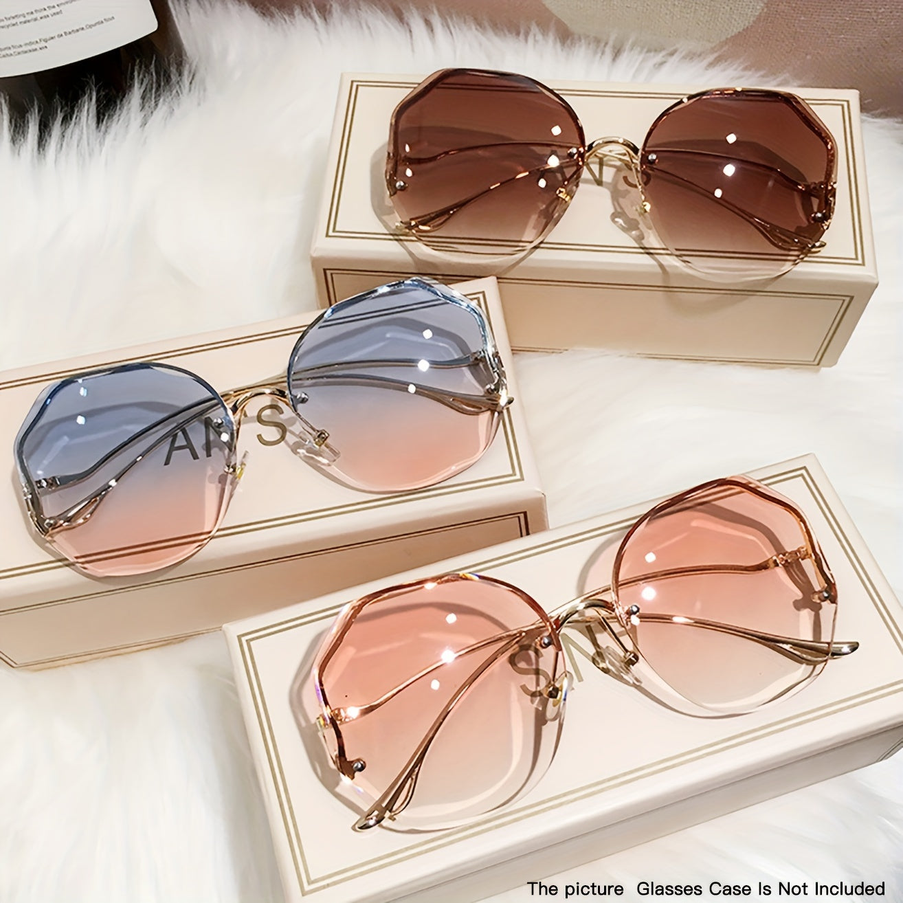 Luxury frameless round glasses for women with stylish gradient lenses and metallic finish.