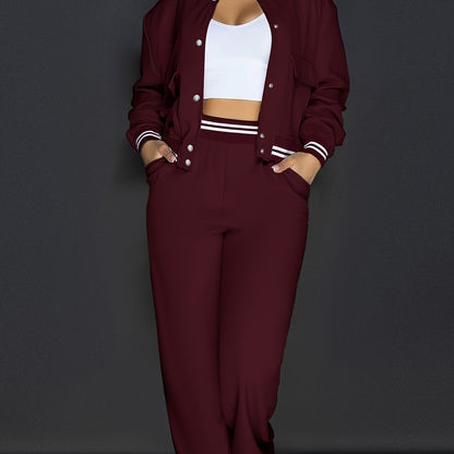 Stylish green two-piece set for women, perfect for vacation. Includes crop top bomber jacket and straight-leg pants with pockets. Made of stretchy polyester and elastane blend that is