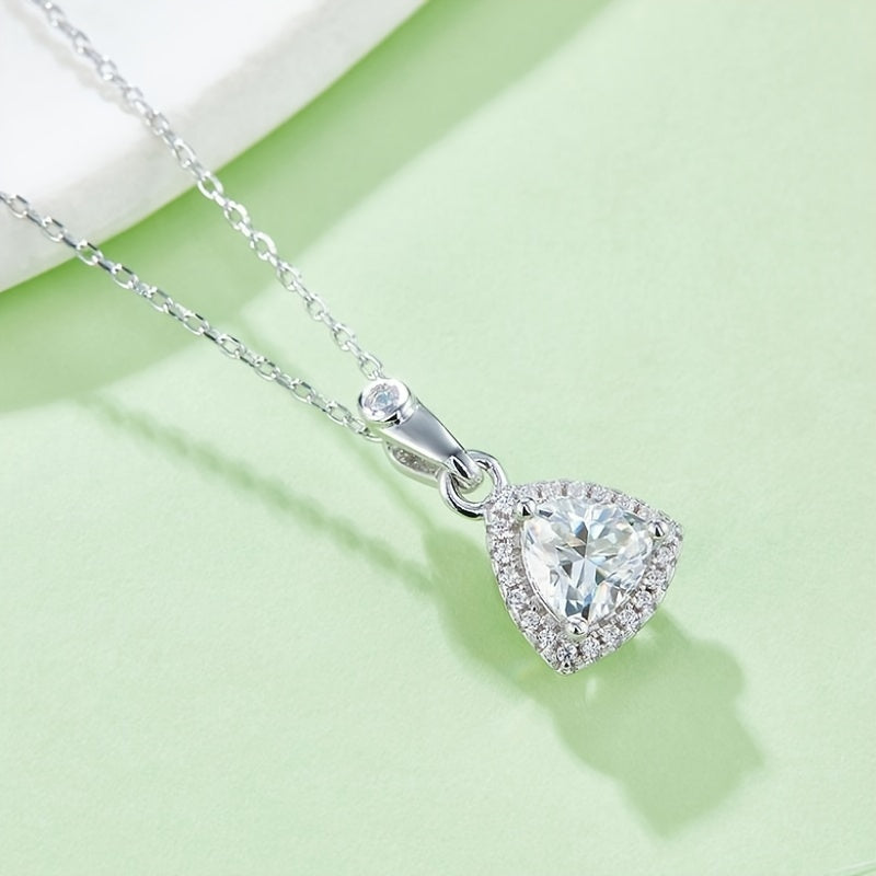 Sleek and sophisticated S925 silver-plated triangle pendant necklace and earring set adorned with sparkling moissanite gems. The perfect choice for an elegant party or birthday gift for teenage girls. Also ideal for holiday or party decorations, bridal