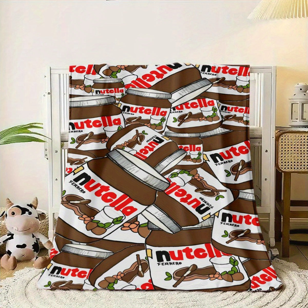 Get cozy with this Nutella print flannel blanket! Made of soft polyester, this all-season throw is hypoallergenic, lightweight, and perfect for use on your sofa, bed, office, car, or during travel. Featuring a Bohemian style and quilted design, this