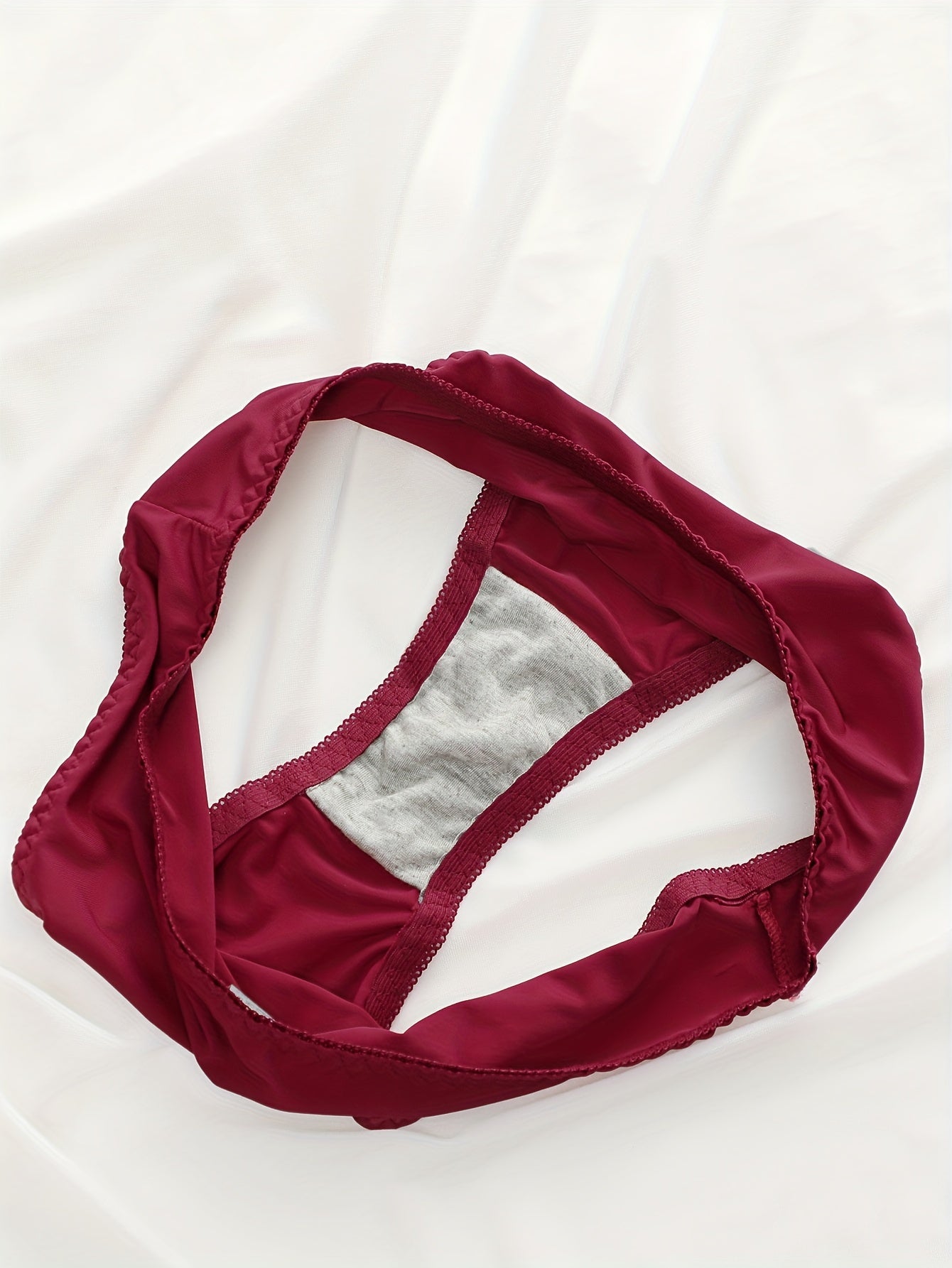 European and American casual women's underwear set with low elastic waistband and steel ring detailing, featuring a one-piece mid-waist design and non-removable coaster triangle panties.