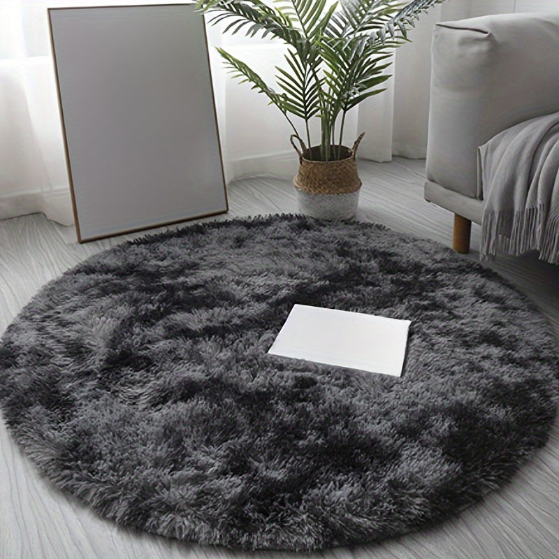 Get your hands on the luxurious 1pc Ultra-Soft Plush Round Mat, designed with a non-slip feature and machine washable for convenience. Available in Light Grey and Black Grey, this cozy floor mat is perfect for adding a touch of elegance to your bedroom