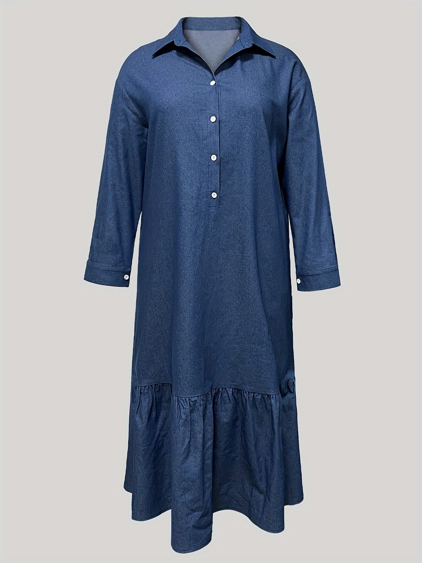 Maxi denim dress in washed blue for plus-size women, with ruffled hem and button-up long sleeves.