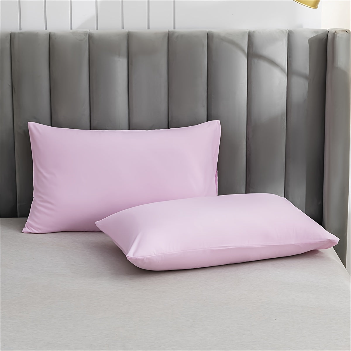 Soft and plush pillowcase with a solid color design, featuring a thick and cozy feel. Includes an envelope closure and is machine washable, making it ideal for creating a comfortable bedroom atmosphere.