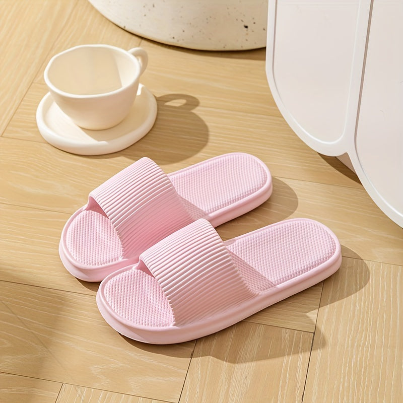 Gender-neutral EVA pillow slides with solid color, lightweight soft sole for home and beach comfort.